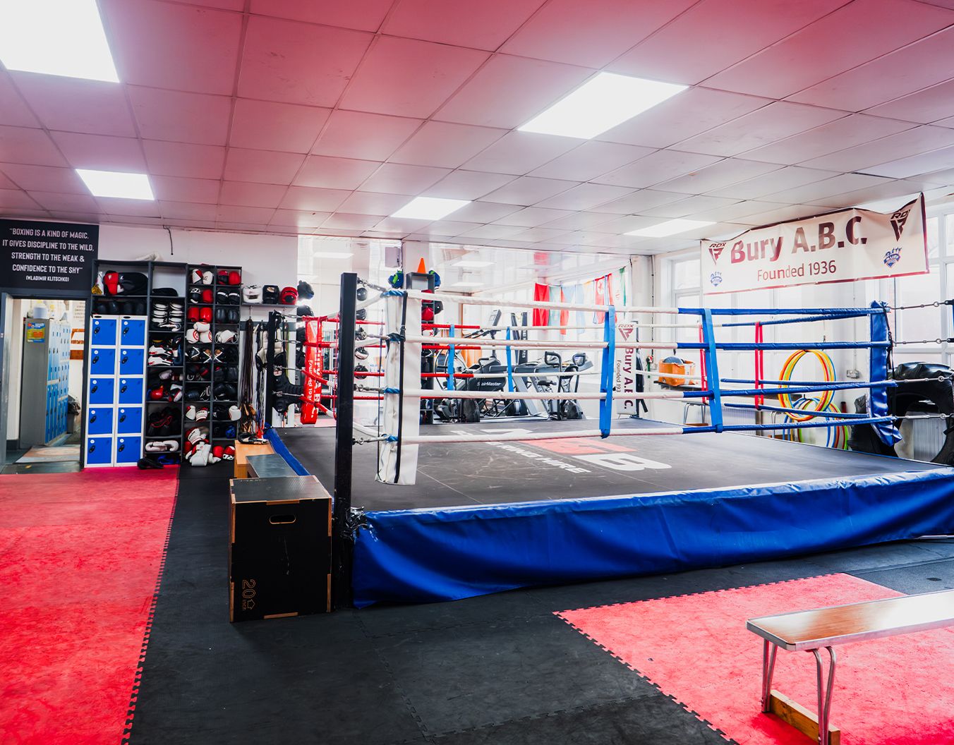 Photo of a boxing ring inside a boxing gym